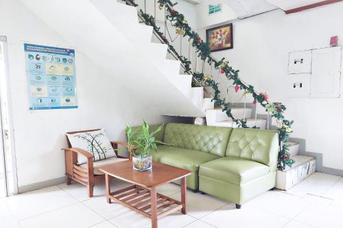 Posezení v ubytování Charlz Angel Inn Iloilo