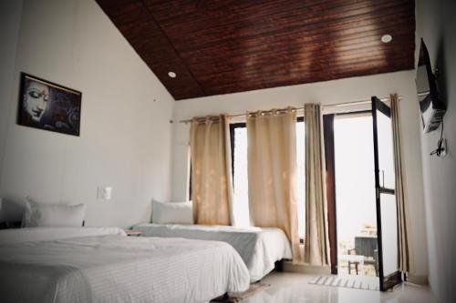 Кровать или кровати в номере The Himaya's resort