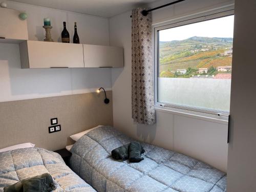 Postel nebo postele na pokoji v ubytování Le Bouchon de Liège