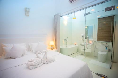 Cama o camas de una habitación en villa Sanford