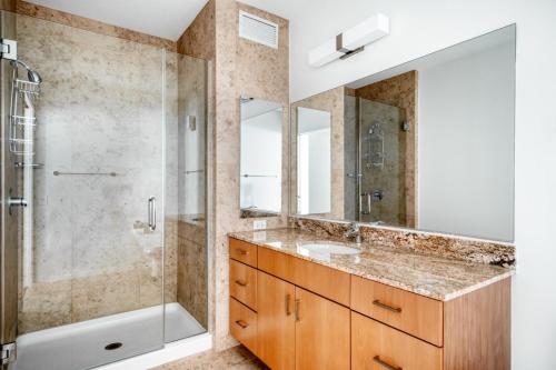 a bathroom with a sink and a shower at Streeterville jr 1br w pool gym nr Riverwalk CHI-875 in Chicago