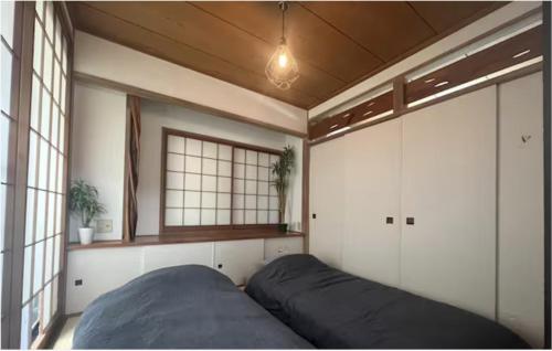 Cama o camas de una habitación en Tokyo Stay Otsuka First