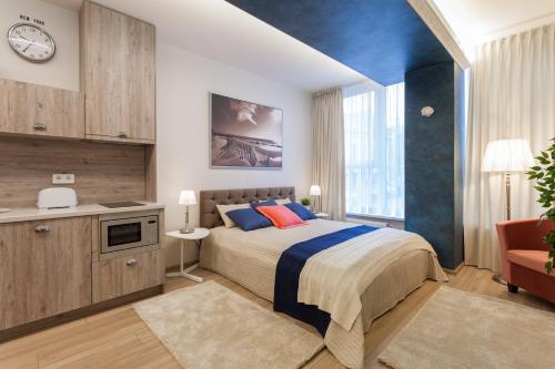 Η κουζίνα ή μικρή κουζίνα στο Raugyklos apartamentai