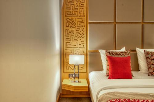 Azalaï Hôtel Dakarにあるベッド