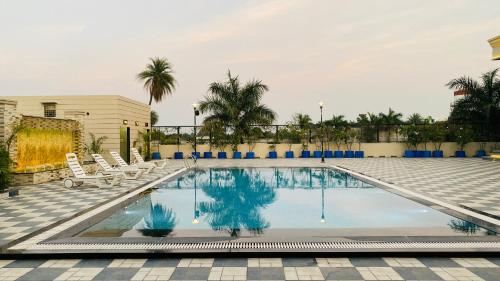 Bazén v ubytování Gaurison Hotel and Resorts nebo v jeho okolí