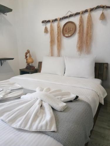 Ein Bett oder Betten in einem Zimmer der Unterkunft Scala Otel