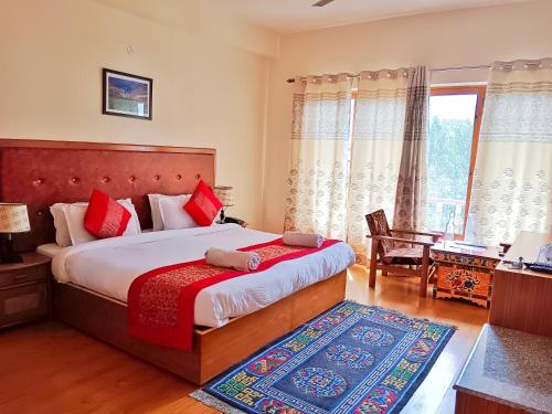 Un pat sau paturi într-o cameră la Kidar