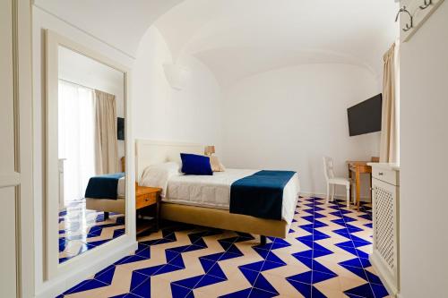 Hotel Da Raffaeleにあるベッド