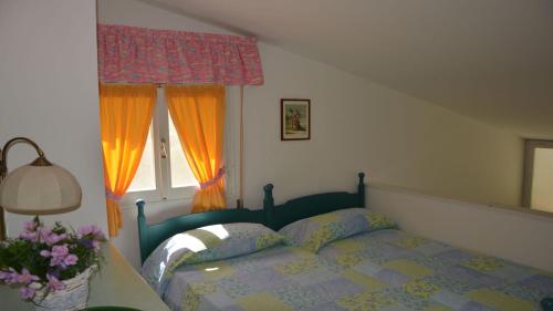 Krevet ili kreveti u jedinici u okviru objekta Bright villa in Caorle, private garden - Beahost