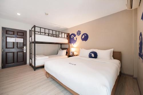 Postel nebo postele na pokoji v ubytování Kokotel Krabi Ao Nang