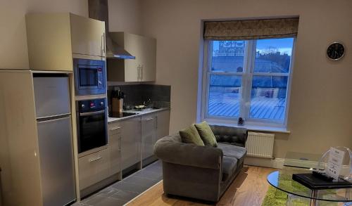 Kuchyň nebo kuchyňský kout v ubytování Harrogate Lifestyle Luxury Serviced ApartHotel