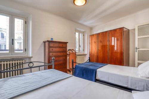 Postel nebo postele na pokoji v ubytování San Marco - Casa Casoni