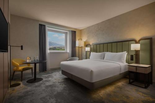 Кровать или кровати в номере Hilton Sofia
