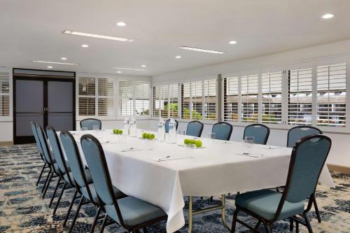 a large conference room with a long table and chairs at Hilton Garden Inn Monterey in Monterey