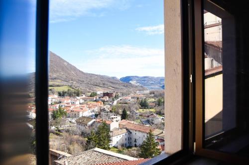a view of a city from a window at Affittacamere Ellera Verde in Villetta Barrea