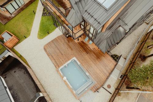 an overhead view of a swimming pool in a house at Lipowy Dwór in Zakopane