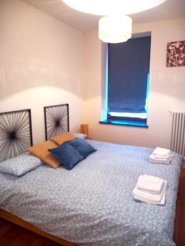 Cama o camas de una habitación en Albergo Diffuso Val d'Incarojo
