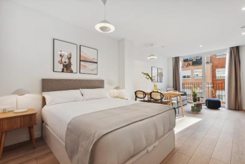 Ένα ή περισσότερα κρεβάτια σε δωμάτιο στο Limehome Valencia Carrer del Pare Palau i Quer