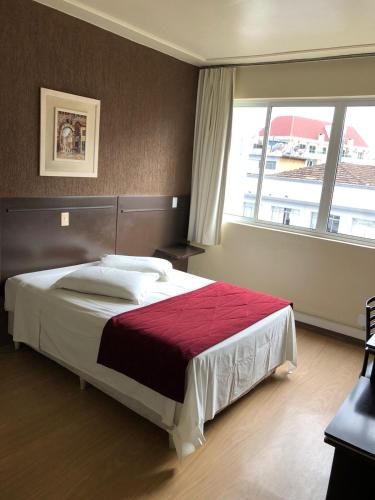 Postel nebo postele na pokoji v ubytování HOTEL RIAD