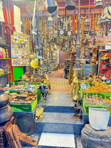 a store filled with lots of different types of merchandise at Muttrah Souq and Sea View in Muscat