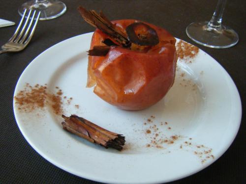 a white plate with a piece of food on a table at Hotel Mirador in Algeciras