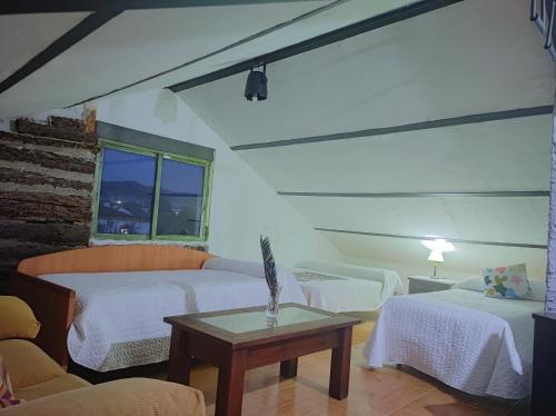 Postel nebo postele na pokoji v ubytování Casa Los Naranjos