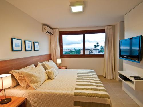 TV a/nebo společenská místnost v ubytování Quintas Private Residence