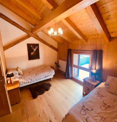 Ένα ή περισσότερα κρεβάτια σε δωμάτιο στο Chalet La Grange