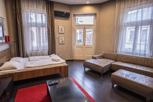 Ένα ή περισσότερα κρεβάτια σε δωμάτιο στο Kelemen Apartment