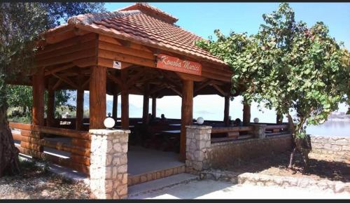 a gazebo with a coca cola sign on it at Leon & Ema in Donji Murići