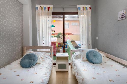 Katil atau katil-katil dalam bilik di El Oasis de Las Caletillas