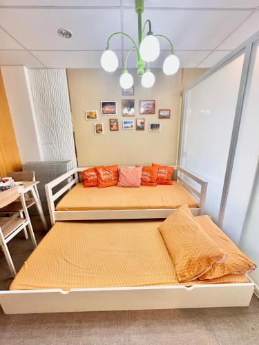 Postel nebo postele na pokoji v ubytování 3 Smart Condominium in Cagayan de Oro City