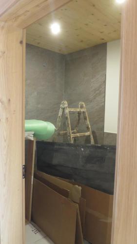 a room being remodeled with boxes and a sink at Ferienhaus & -wohnung Flatscher in Waidring