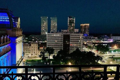 a view of a city skyline at night at Penthouse en Buenos Aires in Buenos Aires