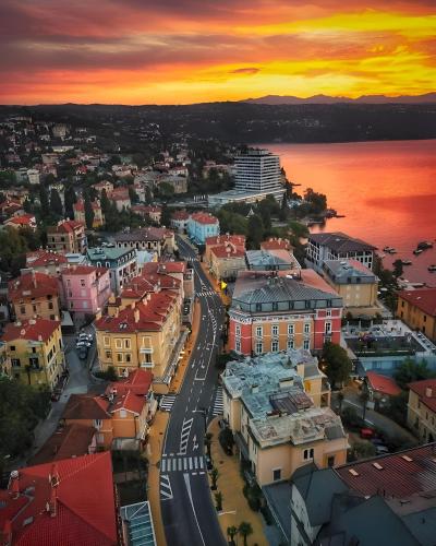 an aerial view of a city at sunset at Apartment FERIA 1 in Opatija