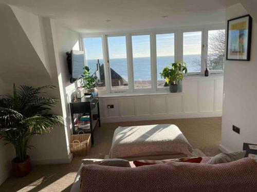 a living room with a view of the ocean at The Turret- the best view in Folkestone in Folkestone