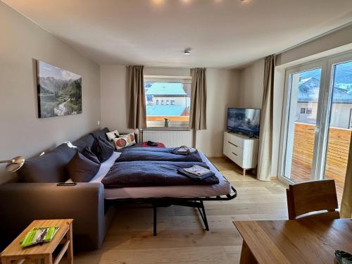Ruang duduk di Ribisel Apartments für Familien - Alpentherme inklusive!