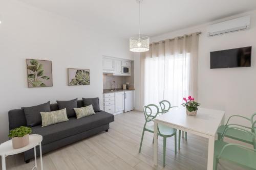 Μια τηλεόραση ή/και κέντρο ψυχαγωγίας στο Faro Guest Apartments