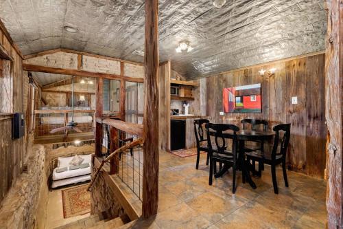 a kitchen and dining room with a table and chairs at #6 The Root Cellar in New Braunfels