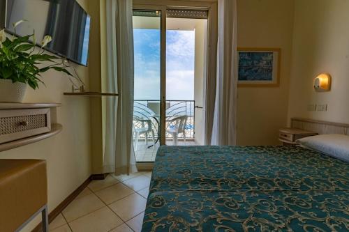 Postel nebo postele na pokoji v ubytování Hotel Prestige