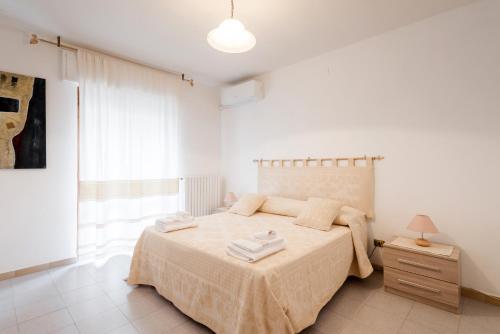 En eller flere senge i et værelse på Sunway Apartments