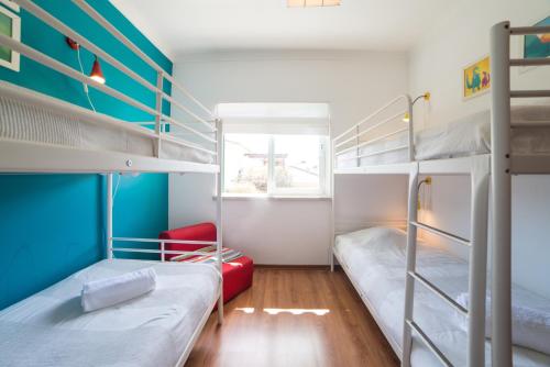 Postel nebo postele na pokoji v ubytování BmyGuest - Casa da Hera Villa Meco