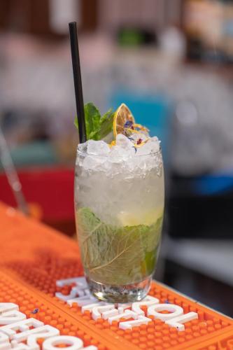 a drink sitting on top of a table at Ostello degli Elefanti in Catania