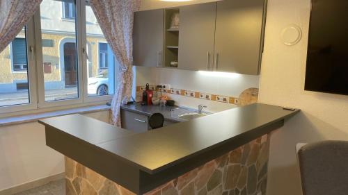 Kuchyň nebo kuchyňský kout v ubytování Zentrale, moderne Wohnung in Graz