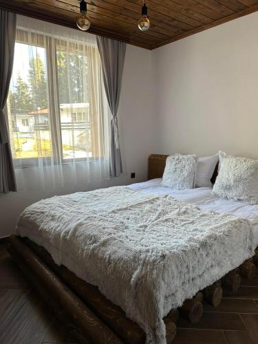 Postel nebo postele na pokoji v ubytování CHALET ELEVEN