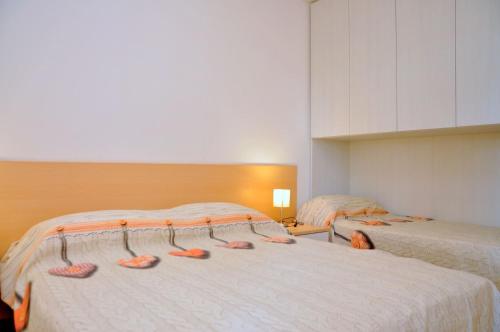 A bed or beds in a room at Splendid flat with terrace - Beahost Rentals