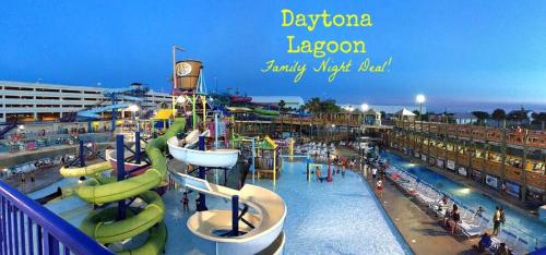 a water park with a roller coaster and slides at *NEW* Gorgeous Sunshine - 2BD/1BA - Private Fenced Backyard! in Port Orange