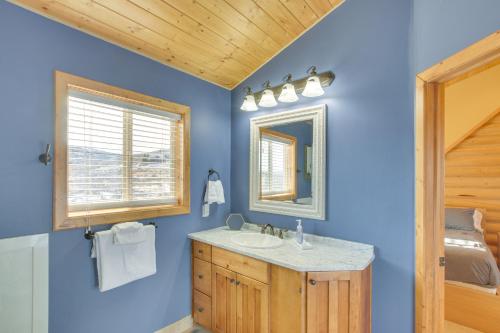 a bathroom with a sink and a mirror at Garden City Cabin about 6 Mi to Bear Lake State Park! in Garden City
