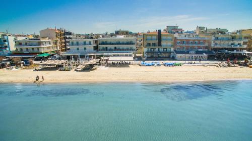 a view of a beach with a group of buildings at KSP1STUDIO in Perea