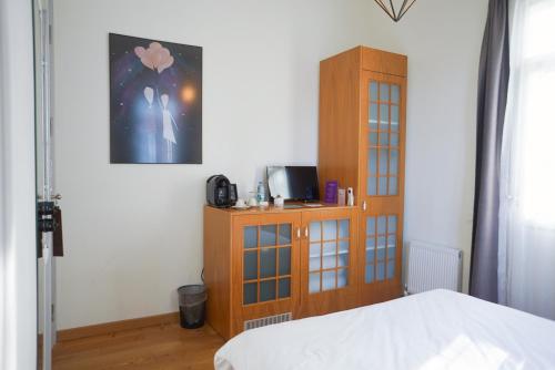 Ένα ή περισσότερα κρεβάτια σε δωμάτιο στο Serguzest Otel